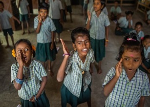 Children playing and learning in community program